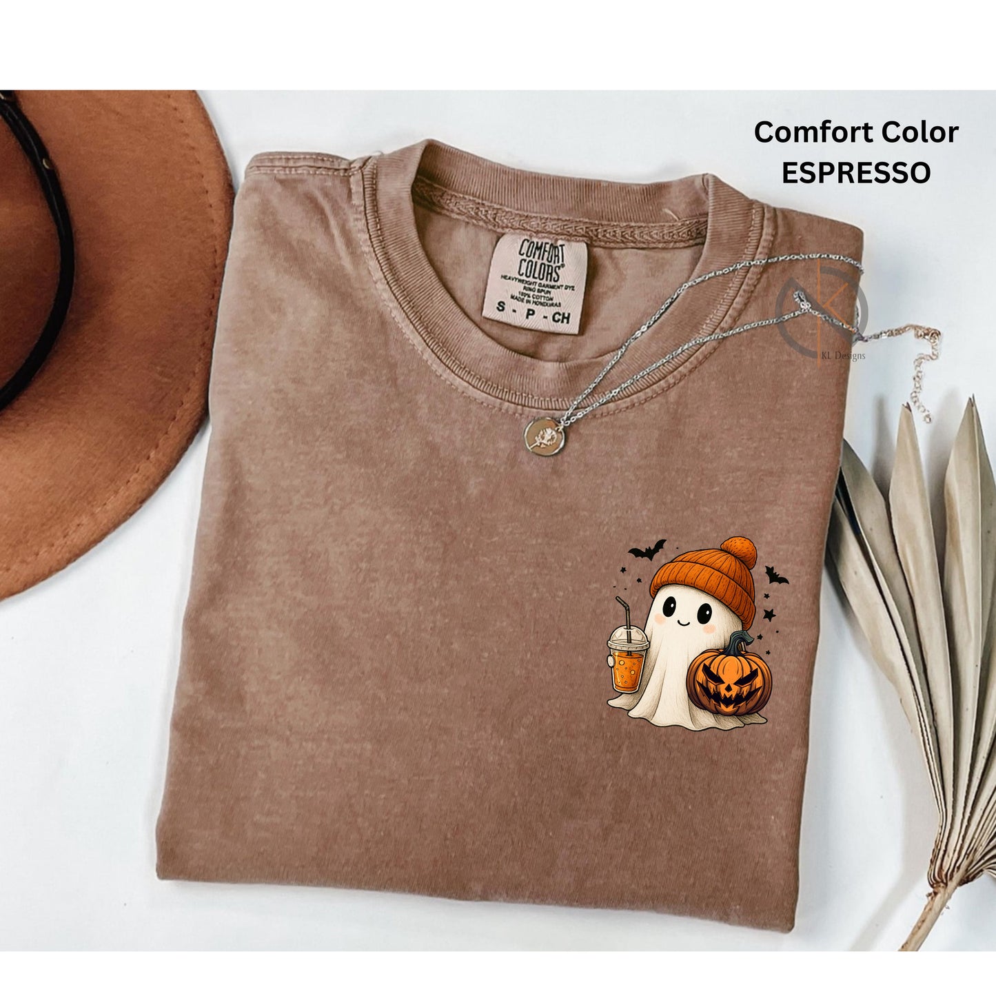 Folded Espresso t-shirt with Halloween ghost design on a white background